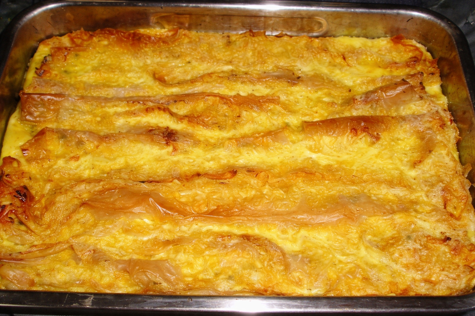 Placinta creata cu branza dulce si stafide